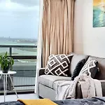 Skyline Sojourn Studio With Parking And Sea Views