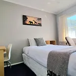 Spacious 4 Bedroom Home With Free Parking