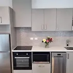 Modern, Central City, Penthouse Floor Apartment.