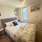 Sky Tower Views From This Modern Apartment Balcony
