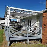 White Weather Board House